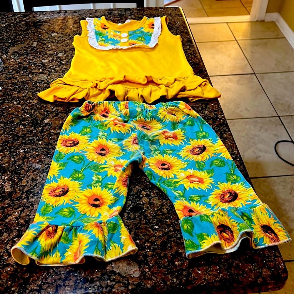 A two piece sunflower gold and green Capri set for a little girl size 5